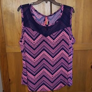 Coral and Navy blue blouse.